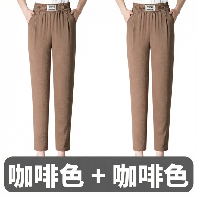 将图片中两条裤子裤腰中间的商标，替换为参考图上的商标，文字是CHINA@，效果要自然，保持裤子整体清晰，图片比例为1:1预览效果