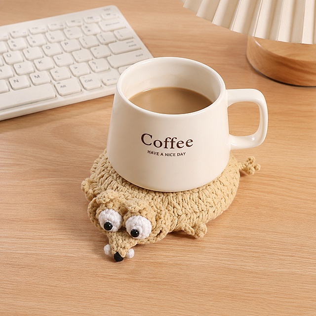 [Main Image 3] Scene matching display, light warm study desktop scene, warm and comfortable home atmosphere. Place the hand-crocheted bear decompression coaster under the coffee cup on the wooden desk, with a white keyboard next to it, showing the real use effect, keep the coaster's shape, color and material consistent with the original product. The overall picture is warm and natural, the product is the visual focus, reflect the integration of the product and home space, 1:1 square, super HD commercial photography. Keep all text in English. Negative prompts: deformation, text disorder, blurry product, cluttered background, watermark, e-commerce platform logo