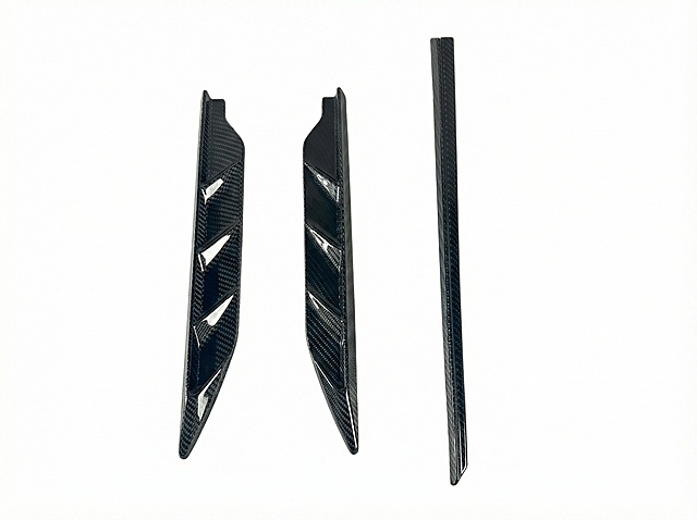 Professional e-commerce retouching for carbon fiber auto parts, precise intelligent cutout to retain the complete outline and carbon fiber texture details of the parts, no edge jaggedness/fringing/missing cutout, replace the background with pure high-definition white (#FFFFFF) without impurities; retouch and enhance the unique twill texture and matte/bright luster of carbon fiber, restore the high-gloss delicate texture of carbon fiber, optimize the three-dimensional light and shadow of the product (soft commercial lighting, no double image/no overexposure/no extra projection); repair tiny scratches/dust/fingerprints/water stains on the surface of the parts, brighten the product color without color cast, improve the image sharpness to ultra-clear, 8K ultra-high definition resolution, commercial product photography standards, pure white background without any extra elements, the product subject is centered in the composition, the texture of carbon fiber material is real and prominent, suitable for product display on Alibaba International Station/Amazon e-commerce platforms