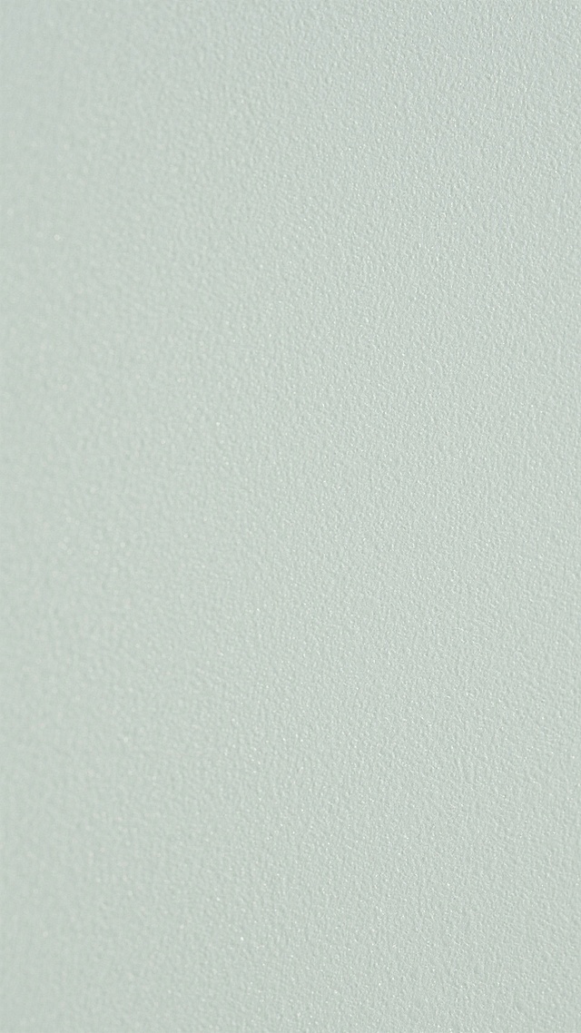 一张纯色纹理背景图，整体呈现出一种细腻的磨砂质感，纹理均匀且柔和，没有明显的图案或花纹，只有细微的颗粒感和浅浅的肌理变化，色彩为统一的纯色，画面简洁干净，具有自然的材质美感。