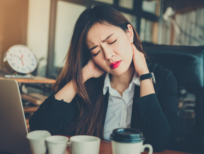 A young Asian female professional in office wear, massaging her neck with a pained and exhausted exp预览效果