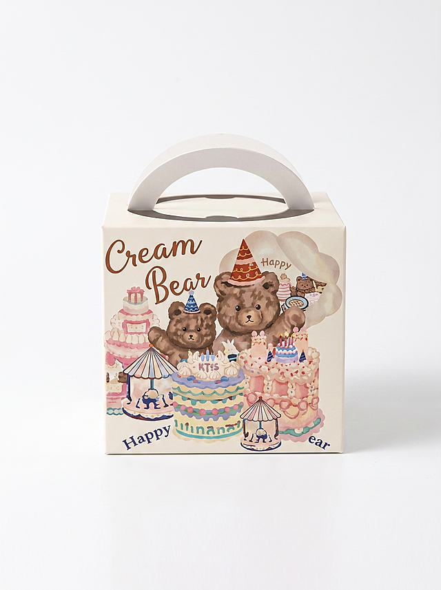 [Main Image 1] Full product display of assorted portable cake boxes. [Atmosphere Style] Clean, professional cross-border e-commerce product photography, sweet cute style. [Quality] Commercial photography texture, soft bright light, product clear real, picture clean advanced. [Elements] The main Cream Bear portable cake box with handle placed in the center of a pure white background (#FFFFFF), product accounts for 85% of the picture. The cute bear cartoon printing, cream color matching, paper material, handle structure are completely consistent with the original product, no distortion or color difference. No extra decorations. [Lighting] Soft even studio lighting, front main light, auxiliary light fill shadow, highlight the paper material texture, light contrast comfortable. [Color Matching] Pure white background, product main cream beige with pink illustration. [Perspective Composition] Front flat view, product centered, full display without cropping, no border. [Text Layout] Keep product's own English text clear, all text English, no extra marketing text, no Chinese characters. [Proportion Resolution] 3:4 ratio, 2k resolution, text clear recognizable, ultra HD. [Negative prompt] Deformation, watermark, text disorder, blurred product image, messy background, extra Chinese characters.