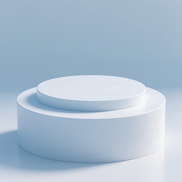 3D渲染的写实风格展台，具有纹理的淡蓝色表面，柔和的高光和微妙的阴影细节，呈现出统一而富有变化的视觉效果，圆形双层结构，简洁现代，光线均匀，立体感强，清新色调，画面干净，白色圆形展台，简洁现代设计，双层圆形结构，底部较宽顶部略窄，表面光滑带有细微纹理，柔和均匀的光线照射，顶部边缘有自然高光，底部边缘有微妙投影，整体立体感强，画面干净留白充足，极简主义设计风格，高分辨率渲染，材质表现细腻，阴影过渡自然。