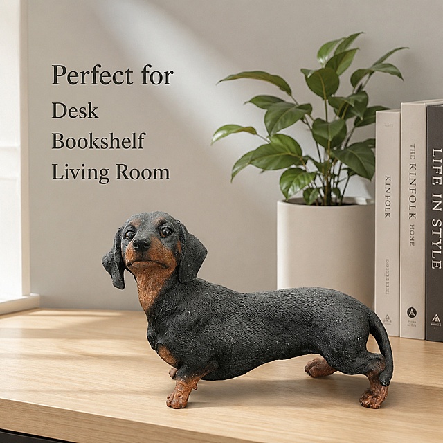 [主图3] Indoor decoration display，腊肠犬雕像摆放在现代简约风格书房书桌展示场景。保持腊肠犬雕像摆件的外观、物理结构、材质质感、颜色和输入产品图绝对一致，杜绝任何变形和色差，精细化处理。雕像放置在浅原木色书桌面上，旁边搭配少量书籍和绿叶盆栽做点缀，背景为浅灰色墙面，营造温馨居家生活感。商品主体清晰突出，占比合理，环境衬托产品不抢主体。商业摄影质感，自然柔和午后光线，氛围温馨舒适。主光从侧面窗户射入，形成柔和光影层次，明暗过渡自然。主色调为浅原木暖调搭配浅灰，产品黑棕颜色自然突出。所有文字使用英文，左侧负空间分行标注"Perfect for
Desk 
 Bookshelf 
 Living Room"，文字清晰不遮挡主体。输出要求1:1比例，文字清晰可辨，超高清商业摄影质感。负向提示词：变形，文字错乱，产品图模糊，背景杂乱，水印，电商平台Logo，中文内容，营销文案，装饰边框，多余道具。