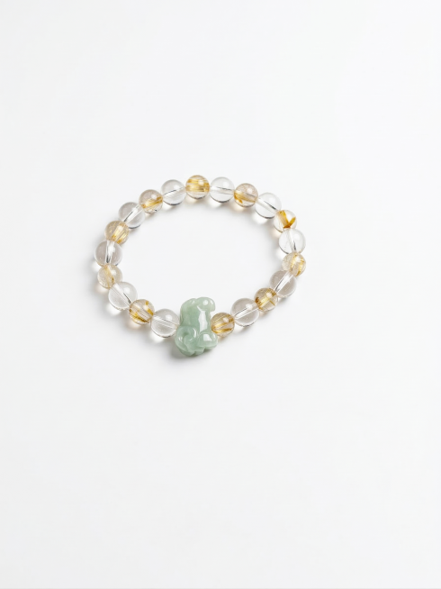 保持原画面构图、内容和细节不变，精修这串水晶貔貅手串，抠出产品放置在纯净的白色背景中，无阴影。修复去除表面划痕、灰尘和瑕疵，修复破损细节，去除表面纯黑色反光和杂色，增加水晶的层次感和通透性，使其纯净通预览效果