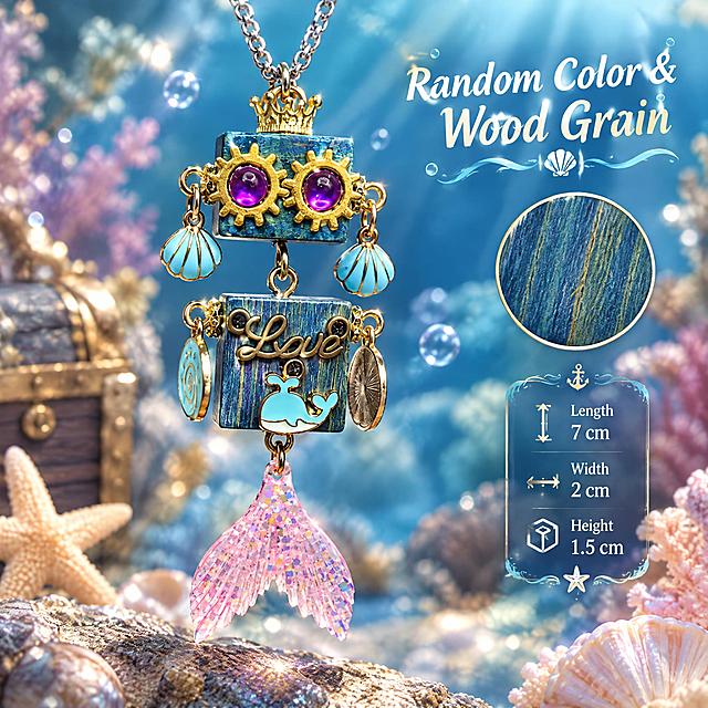Amazon cross-border e-commerce main image, 1:1 ratio, scene display image, no white background. The product is a cute steampunk wooden robot pendant necklace with blue wood grain square body, golden gear eyes with purple gems, golden crown on top, light blue shell earrings, 'Love' lettering, light blue whale decoration, and pink glitter mermaid tail pendant. Pendant size: 7cm long, 2cm wide, 1.5cm high. The pendant is hanging from a silver chain, displayed in a dreamy ocean-themed scene with soft lighting, high-end product photography style. English text on the image: "Random Color & Wood Grain". Professional commercial photography, sharp focus, high detail, suitable for Amazon product listing.