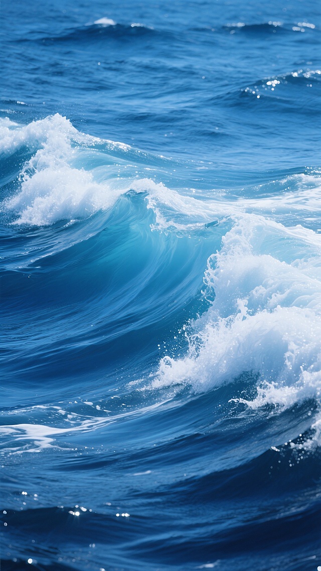 一张具有高级感的海洋背景图，画面中深蓝色的海水与明亮的浅蓝色波浪相互交织，形成富有动感的视觉效果。海水表面波光粼粼，白色的浪花在蓝色的海水中翻滚，展现出海洋的磅礴气势与生命力。整体色调以蓝色为主，从深邃的藏蓝到清澈的浅蓝渐变过渡，色彩和谐统一，营造出宁静而又不失力量感的氛围。画面构图采用近景特写海浪的方式，突出海水的质感和波浪的形态细节，光影效果自然，高光部分明亮而不刺眼，阴影部分深邃而富有层次，展现出高品质的摄影质感和细腻的画面表现力，适合作为高级感的背景使用。