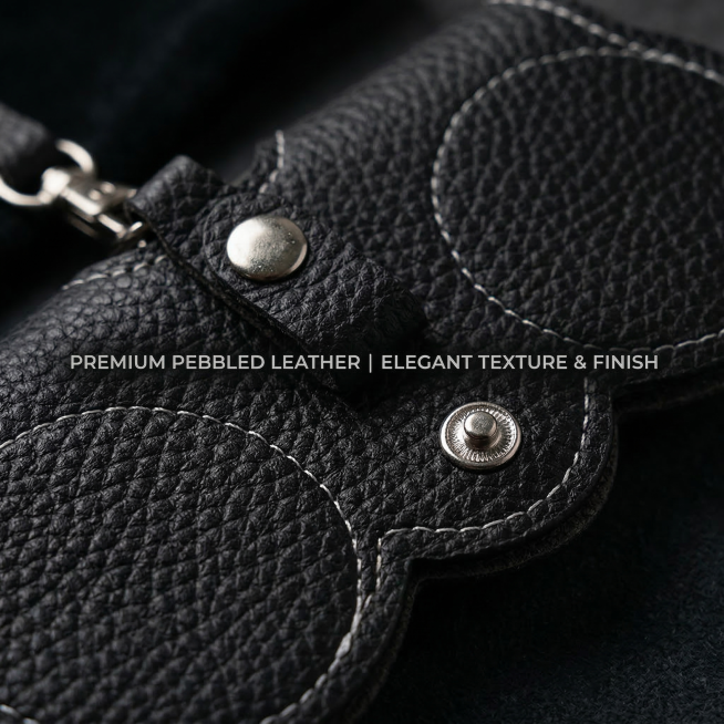 Close-up luxury shot of the black pebbled leather texture of the sunglasses case. Soft lighting high预览效果