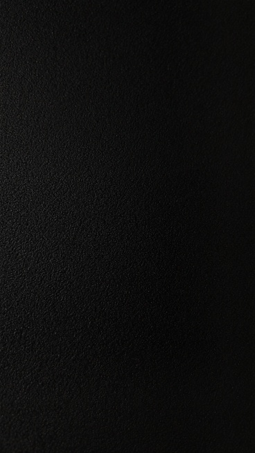 纯黑色背景，带有细腻均匀的磨砂质感纹理，整体呈现出深邃沉稳的氛围，无任何文字、图案或其他元素干扰，仅突出黑色背景本身的不同纹路细节。预览效果