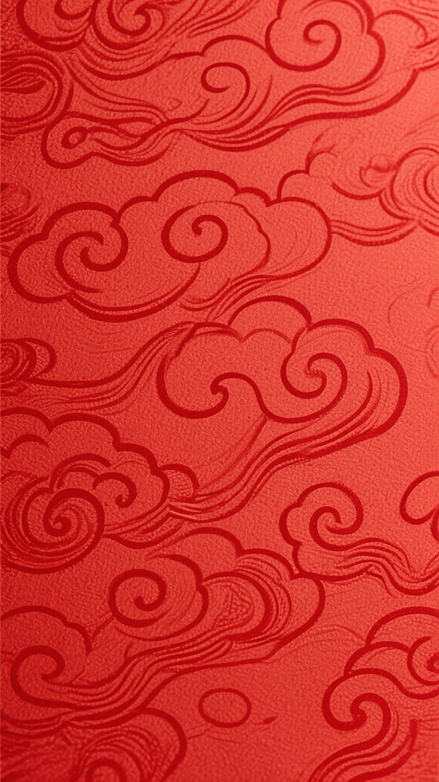 一张纯红色背景的图片，背景上有暗红色的、细腻的、卷曲的云纹图案，整体呈现出一种带有轻微纹理的、哑光的纸张质感，色调均匀，营造出一种典雅、传统且喜庆的氛围。