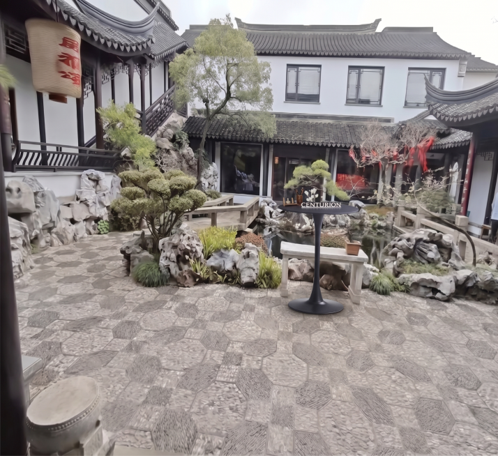 图2中不锈钢立牌放到图1画面中间白色的石台上。 保持立牌原比例和清晰度预览效果