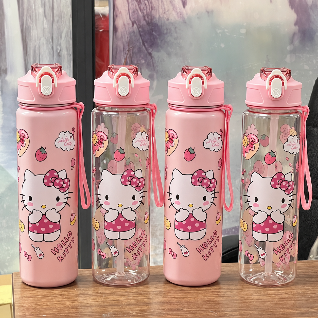 将图中四个水杯全部替换为图2中的Hello Kitty粉色水杯… - 图片创意预览