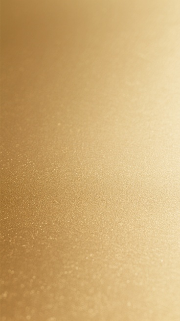 金色背景，简洁风格，带有细微纹理和渐变效果，整体呈现出柔和的金属光泽质感，色调从浅金到深金自然过渡，保持简洁大气的视觉感受，变换为带有细腻磨砂颗粒感的样式，无任何图案和文字元素。预览效果