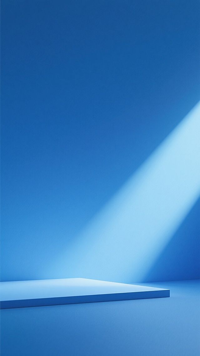 干净风格的蓝色场景背景素材，画面以不同深浅的蓝色渐变为主，从上方较深的蓝平滑过渡到下方较浅的蓝，右下角有一道明亮的浅蓝色光束斜向穿过，底部有一个浅蓝色的平面，整体光影柔和，符合现实逻辑，简洁大方，适合作为背景使用。