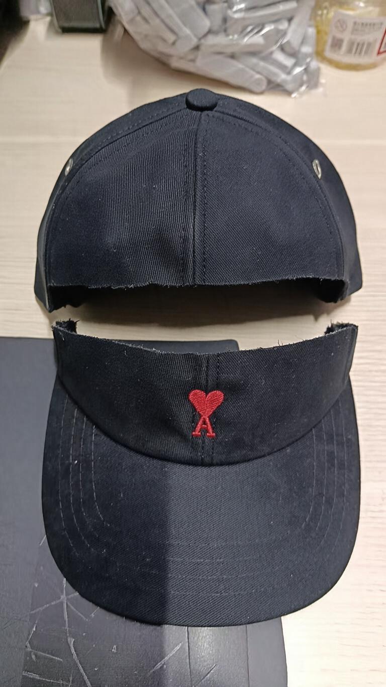 A black six-panel baseball cap… - 图片创意预览