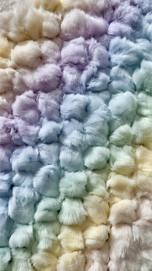 一张毛绒质感的背景图，由大量蓬松、柔软、卷曲的毛发状纹理组成，整体呈现出紧密排列的不规则块状图案，毛发纹理清晰可见，具有强烈的立体感和触感。保持原有的毛绒风格、纹理密度和排列方式，将颜色调整为淡紫色、浅蓝色、薄荷绿、鹅黄色和浅灰色的柔和组合，色彩过渡自然，整体色调清新淡雅，光线柔和均匀，无明显阴影，营造出温暖舒适的氛围。