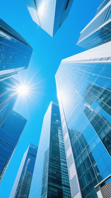 现代化办公场景，多栋高耸的玻璃幕墙摩天大楼，从低角度仰视拍摄，湛蓝的天空作为背景，阳光从楼宇间照射下来形成明亮的光斑和反光，玻璃表面清晰反射出周围建筑和天空的景象，整体呈现出干净、通透、专业的商业氛围，建筑线条硬朗，结构分明，光线充足，色调以蓝色和白色为主，营造出高端、现代的办公环境感觉。预览效果