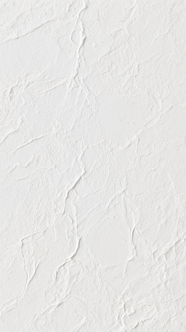 一张具有细腻纹理的底纹图片，纹理呈现出不规则的细微线条和斑驳质感，整体风格偏向简约、自然，类似纸张或石材的纹理效果，光线均匀柔和，无明显光影对比，色彩为纯白色，保持纹理的清晰度和自然感。