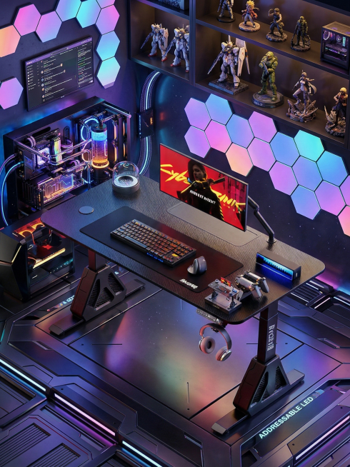 将图中的背景替换为充满科技感的电竞房场景，保留原图中的电竞桌、显示器、键盘、鼠标、音箱等桌上设备，电竞房要有RGB氛围灯光、电竞主机、游戏手办等元素，整体风格酷炫有科技感预览效果