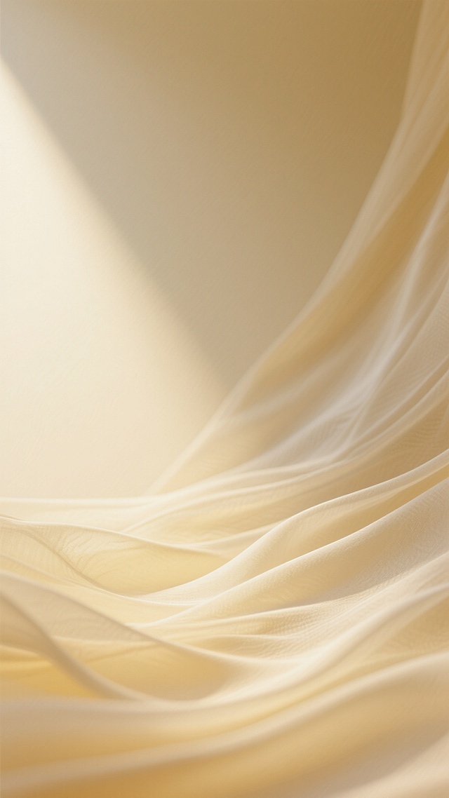 一张以柔和流动的淡黄色为主色调的抽象背景图，整体呈现出轻盈飘逸的视觉风格，具有细腻的渐变色彩过渡和模糊的纹理质感。画面中光影效果经过调整，形成从左上角向右下角倾斜的光源投射，左侧区域光线更为明亮通透，右侧则带有淡淡的阴影层次，增强了空间的纵深感。纹理方面呈现出类似丝绸织物被微风拂过的细腻褶皱，同时融入了细微的波纹肌理，使整体画面在保持柔和基调的同时增添了更多丰富的细节变化，营造出温暖、舒适且富有动感的氛围。