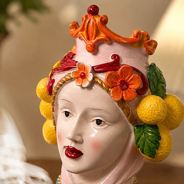 [Main Image 3] Local detail close-up of Mediterranean pink queen vase, highlighting craft details. Keep the product appearance (physical structure, material texture, color decoration) completely consistent with the input product image, focus on amplifying the top flower lemon decoration and glaze texture, show hand-painted color layering and ceramic gloss, fine processing. Warm home living atmosphere, commercial photography texture, soft natural light, details clear. Light: Soft directional light, highlight the concave-convex texture of decoration, the glaze presents a soft ceramic gloss, texture full. Color matching: product original pink orange yellow green color, low saturation light retro background. Perspective composition: close-up 45-degree shooting, focus on decoration details, shallow depth of field. Output requirement: 1:1 ratio, ultra HD commercial photography texture. Negative prompt: deformation, text disorder, product blur, cluttered background, watermark, e-commerce platform Logo.