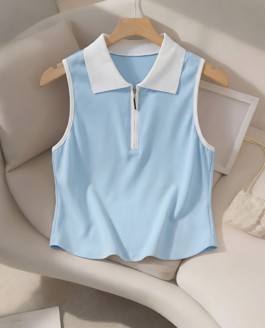 将这件挂着的无袖上衣衣身杏色改成浅色天蓝色，所有黑色包边改成白色包边，保持整体款式、背景和配饰不变预览效果