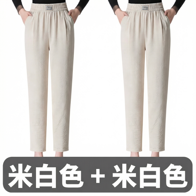 将图片中两条裤子裤腰中间的商标，替换为参考图上的商标，文字是CHINA@，效果要自然，保持裤子整体清晰，图片比例为1:1预览效果