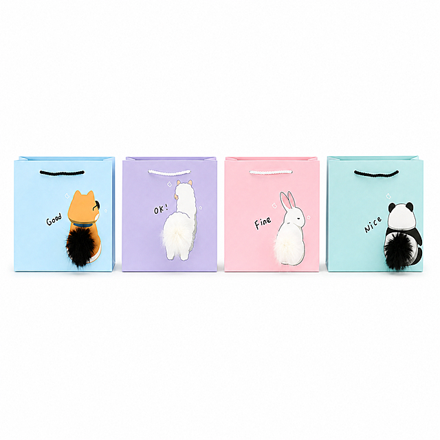 产品精修，产品置于纯白背景上，专业商业棚拍光，5500K标准中性白光，轮廓光，体积光，曝光正确，强烈真实立体感，标准透视校正，正常透视焦段，保持正视图机位，接地处保留干净浅淡的自然接触阴影，严禁大片投影、脏灰阴影和悬浮感，四个卡通礼品袋横向并排整齐陈列，大小一致、间距统一、对齐整齐、底部基线对齐，每个独立礼品袋逐个摆正，逐个校准水平线和垂直轴，主体居中，商品完整入画不裁切，商品外轮廓视觉体量约画面60%-70%，四边均匀留白，极致超清画质，细节清晰锐利，商业级实拍质感，保留原图真实材质与结构细节，提升商品洁净度和商业新品感，清除旧痕、灰暗、脏斑和不均匀色块，修复边缘毛糙、锯齿，边缘自然清晰过渡，锁定原图商品颜色，多件商品逐件对应原图色相、材质光泽和分段色块边界，锁定原图商品轮廓、件数、部件位置、连接关系、标签文字和可见功能细节，只做精修不重绘结构，全部商品须入画，件数、配色SKU、材质光泽逐件对应原图，严禁丢件、合并、串色或互换颜色，强制落地，严禁悬空，包型比例不变，提手、缝线位置与原图一致，哑光纸质礼品袋质感，柔和漫反射，低高光，表面细腻，毛球装饰保持真实毛绒蓬松质感，正视图，比例1:1