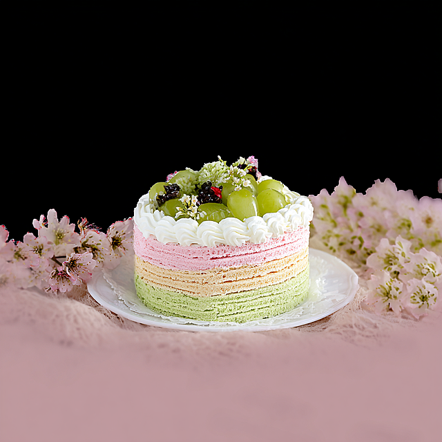 Put the cake from image1, use the color scheme from image2 (light green, pink, warm tones) and the spring atmosphere, arrange the composition according to image3. The cake is placed on a white plate in the center, with a soft blurred background of matching colors, natural fusion of cake and background, natural gourmet light and shadow, no text in the picture.