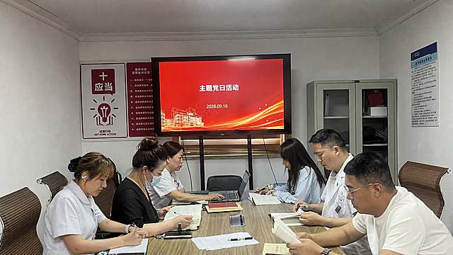将第二张图片中的两位女性人物（左侧穿白色护士服的女性、右侧穿浅蓝色上衣的长发女性）完整移动到第一张图片的会议室场景中，人物的样貌、服装、姿势保持不变。第一张图片原有的会议室环境、大屏幕显示的“主题党日活动 2026.09.16”红色画面、墙上的制度牌、文件柜、桌椅、以及原有的其他人物全部保持不变。将新加入的两位人物自然地放置在会议桌旁的空位上，光影、透视和整体画面风格与原图完全一致，画面真实自然，看不出合成痕迹。