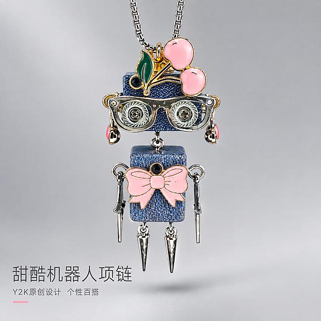 [主图-1] 樱桃蝴蝶结机器人吊坠项链 首图氛围展示。
[统一基调] 京东品质风，简洁稳重，文字占比<30%，一图一重点；整体甜酷潮玩风格，浅灰色高级质感背景，主色调用牛仔蓝+粉色+金属银，字体用纤细文艺无衬线体，标题字色深灰，辅助字色中灰，强调色粉色。
[画面] 项链吊坠居中偏上展示，吊坠完整不切割，占画面约60%；背景为浅灰色哑光质感平面，柔和渐变，干净高级；吊坠下方投射自然柔和的接触阴影，体现悬浮陈列感；吊坠顶部银色链条自然向上延伸出画面，保持原图的牛仔蓝积木机身、粉色樱桃装饰、眼镜造型、粉色蝴蝶结、银色铆钉尖刺细节全部完整保留，金属部分有细腻高光。
[光影质感] 商业珠宝摄影质感，柔光箱主光从左上45度照射，右侧柔和补光，金属边缘有窄条轮廓光，牛仔布料纹理清晰，滴釉部分通透有光泽，整体光影柔和干净，无硬阴影。
[配色] 背景浅灰渐变，产品保留牛仔蓝、粉色、金属银原色，文字深灰+粉色点缀。
[文字版式] 画面左下角放置两行文字，主标题"甜酷机器人项链"大号纤细字体，下方辅助文字"Y2K原创设计 个性百搭"小号字体，文字不遮挡产品主体，整体简洁克制。
[输出要求] 1:1正方形比例，文字清晰锐利，产品细节清晰，无变形错字，无水印无平台Logo，无杂乱元素。