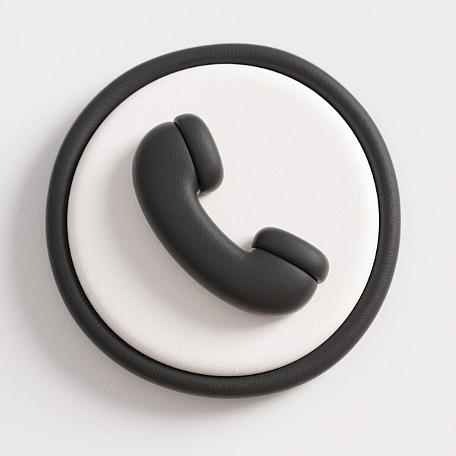 极简卡通风格图标，一个黑色的固定电话听筒图案位于白色圆形中央，听筒造型简约流畅，线条圆润，无任何内部细节或纹理，圆形外框为黑色粗线条，整体设计采用纯黑白两色对比，视觉层级清晰，主体突出，符合卡通风格的简洁明快特性，具有高度的信息传达效率和现代设计感。