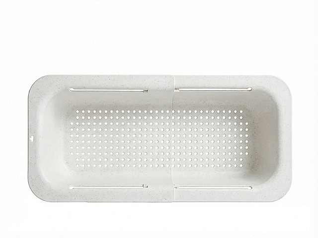 一张 塑料可调节的【灰色沥水篮】 照片/电商产品图，要求对这款灰色可调节沥水篮进行颜色修改，将其变为【白色】，材质是小麦秸秆材质，同时保持产品主体和样式细节不变