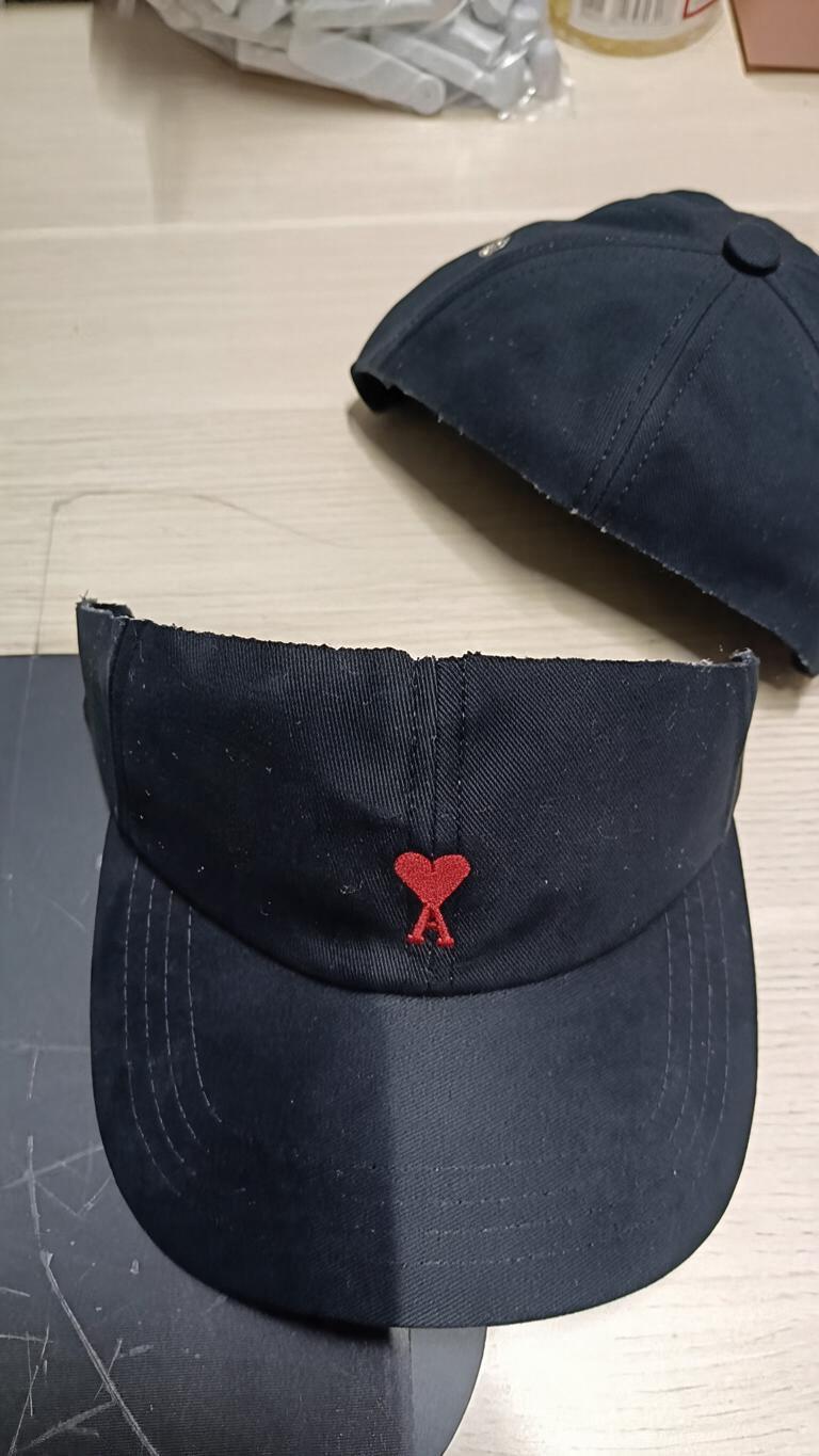 A black six-panel baseball cap… - 图片创意预览