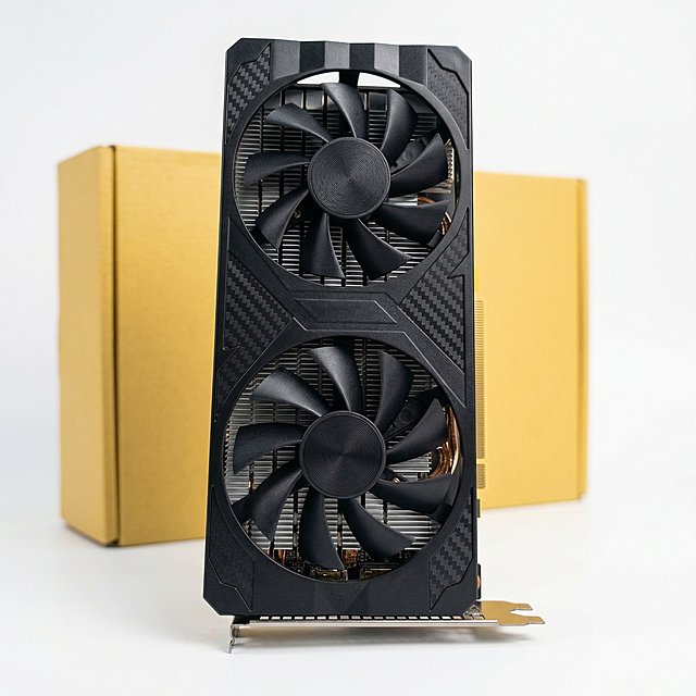 Professional Amazon product main image, NVIDIA RTX 3060 Laptop GPU (desktop variant) graphics card, black dual-fan design with carbon fiber texture, no logo on fans, neutral yellow corrugated cardboard packaging in background, clean white background, high-resolution product photography, sharp focus, no text overlay, cinematic lighting, suitable for e-commerce listing, target audience: PC gamers, content creators, tech enthusiasts.