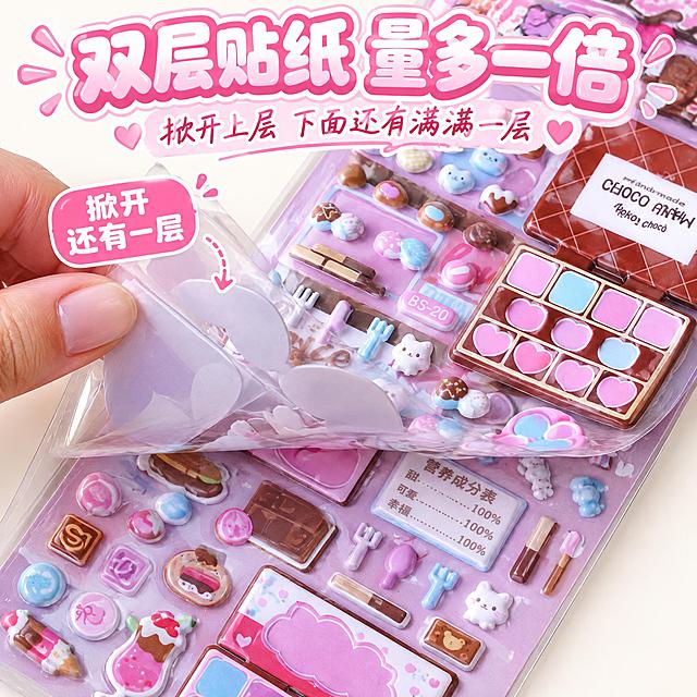 电商主图，1:1正方形构图，高清微距产品摄影。严格还原上传的产品图，包括包装设计、颜色、图案元素等所有细节；产品为初格品牌"呆萌巧克力日常"DIY双层收纳立体泡棉泡泡贴。画面聚焦挂卡中部的双层贴纸区域，挂卡边缘可以裁切掉、不要求完整入镜，视觉重心完全集中在双层贴纸掀开的瞬间。一只小女孩的手（指甲淡粉色）捏住上层贴纸页的左上角边缘、向上掀起约一半，掀起的透明PVC膜带有清晰的折角，能看到贴纸页背面的淡紫色底和兔子耳朵形状的贴纸背面轮廓，形态严格还原参考图。露出贴纸页下面还压着满满第二层贴纸——两层贴纸都密密麻麻排满盘形收纳贴纸（巧克力盒造型、双心造型、Choco棒盒造型）和小元素贴纸（心形糖果、圆形糖果、巧克力块、小爱心、小房子等），两层都看得清清楚楚，直观展示"这一板贴纸有两层，掀开这层下面还有一层，量比普通单层贴纸多一倍"。掀起的边角旁贴一个粉色圆角标签写"掀开 还有一层"，配一条细虚线箭头指向掀起处。画面中不摆放任何对贴完成的桌面成品，全部视觉焦点集中在双层贴纸本身。视觉风格：马卡龙清新风+软萌少女风，挂卡外背景为干净的纯奶白色，无多余道具、装饰；光线均匀柔和，掀起的贴纸页与下层投下淡而柔的接触阴影。字体设计：主标题使用促销氛围类"气泡可爱文字"，圆润胖胖卡通体加白色粗描边和粉色软投影，压在画面顶部中央，内容为"双层贴纸 量多一倍"；副标题使用纤细手写花体，紧贴主标题下方，内容为"掀开上层 下面还有满满一层"。信息布局：双层贴纸特写占满画面，主副标题压顶居中，粉色"掀开 还有一层"标签贴在掀起处旁，无其他多余元素。设计感强调：不必完整展示整张挂卡，边缘可以裁切，放大特写双层贴纸掀开的瞬间；核心是"掀开上层、露出下面还有满满一层"，两层都要满满当当、看得清楚量大；背景干净纯色，不摆散落成品；所有边角圆角处理，色彩低饱和统一，高级甜而不腻；让"双层量大"这个卖点一眼可读。第3张