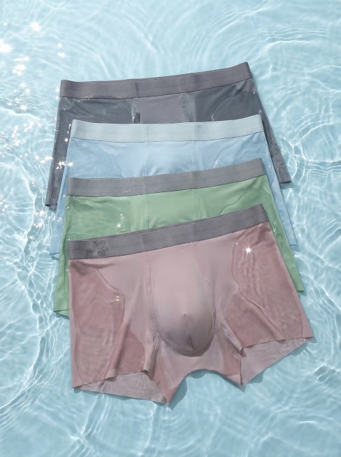 主体泡在波光粼粼、带有闪烁光点的淡蓝色水池里，以俯拍视角呈现，清新、水润的质感，采用写实的产品摄影风格。内裤需要平整顺滑，浸入在水中预览效果