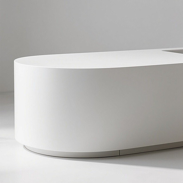 极简主义风格的白色台面，保持干净简洁的配色，台面边缘采用柔和的弧形设计，表面呈现细腻的哑光质感，底部有隐形的简约支撑结构，整体造型现代简约，线条流畅，光影效果柔和，营造出干净、整洁、通透的视觉氛围，无任何多余装饰元素，突出台面本身的形态美和材质感。