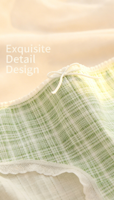 Design detail display, close-up of the small white bow and white lace edge of the women's green plai预览效果