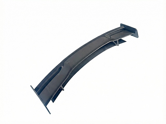 Professional e-commerce retouching for carbon fiber auto parts, precise intelligent cutout to retain the complete outline and carbon fiber texture details of the parts, no edge jaggedness/fringing/missing cutout, replace the background with pure high-definition white (#FFFFFF) without impurities; retouch and enhance the unique twill texture and matte/bright luster of carbon fiber, restore the high-gloss delicate texture of carbon fiber, optimize the three-dimensional light and shadow of the product (soft commercial lighting, no double image/no overexposure/no extra projection); repair tiny scratches/dust/fingerprints/water stains on the surface of the parts, brighten the product color without color cast, improve the image sharpness to ultra-clear, 8K ultra-high definition resolution, commercial product photography standards, pure white background without any extra elements, the product subject is centered in the composition, the texture of carbon fiber material is real and prominent, suitable for product display on Alibaba International Station/Amazon e-commerce platforms