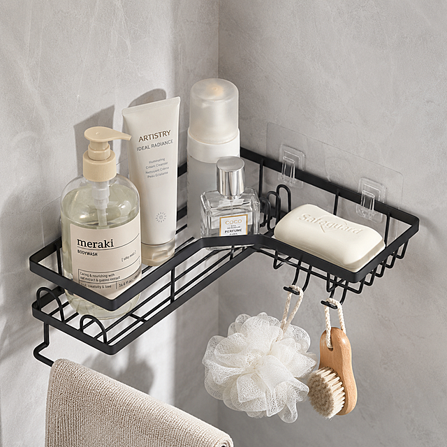 [Main Image 1] Bathroom corner storage shelf in use. [Atmosphere Style] Clean modern bathroom style, simple and high-end; [Image Quality] Commercial photography texture, soft and bright light, clear and real product, clean and advanced picture. [Elements] The black metal L-shaped corner storage shelf is installed at the corner of the tiled bathroom wall, filled with various toiletries such as shower gel, facial cleanser, perfume, soap, hanging bath sponges and towels. The wall is light gray cement tile, and the surrounding is clean modern bathroom environment. Keep the appearance (physical structure, material texture, color) of the product completely consistent with the input product image, eliminate any deformation and color difference, fine processing. The product subject accounts for 70% of the picture, full screen without border. [Light and Shadow] Side natural light, soft and bright, the main light hits the product, auxiliary light fills the shadow, the metal wire mesh shows a clear texture, no strong reflection, layered light and shadow. [Color Matching] Main color matte black, auxiliary color light gray tile background. [Perspective Composition] Head-up perspective, product centered, moderate depth of field, complete product outline without cropping. [Text Layout] No marketing text added, in line with cross-border platform specifications. [Proportion Resolution] 1:1 proportion, 2K resolution; super high definition. [Negative Prompt] Deformation, watermark, text confusion, blurred product image, messy background.