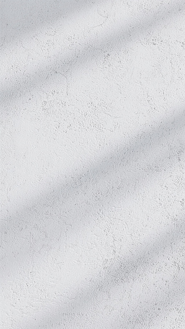 一张灰白色调的水泥墙面背景图，表面呈现出自然的粗糙质感，有细微的颗粒感和不规则的纹理，整体色调均匀，略带斑驳的灰色阴影，营造出一种简约、工业风的氛围，适合作为背景使用。