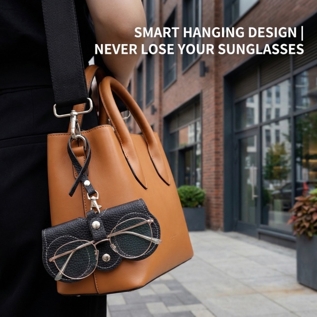 The sunglasses case is shown attached to a stylish handbag strap, demonstrating its portable hanging预览效果