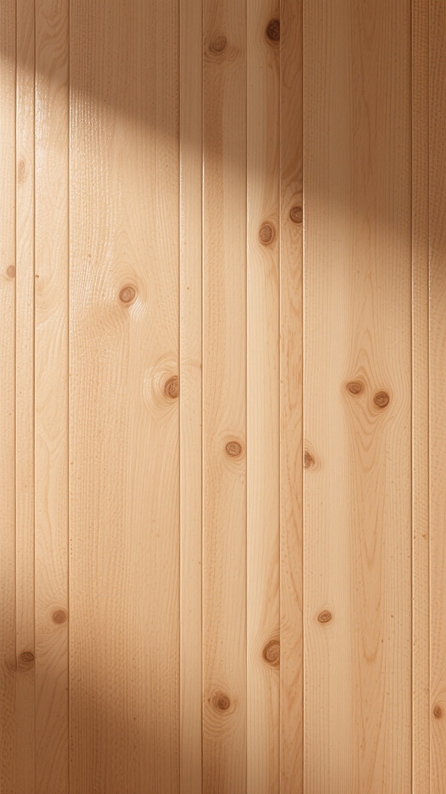一张光滑的木纹背景图片，整体呈现温暖的浅棕色色调，木纹纹理清晰可见，纵向排列的木节和年轮自然流畅，表面有细腻的光泽感，光线均匀柔和地洒在木纹上，形成微妙的光影渐变，营造出简约、自然、质朴的氛围，画面大面积留白，没有任何多余的图案或文字元素，仅以纯粹的木纹质感作为视觉主体，具有良好的信息传达效率和设计感。
