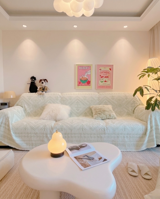 将图https://0.jpg的沙发巾铺设在这张图https://3.jpg的沙发上，保持沙发巾本身原有的颜色和纹理质感不变，保持当前客厅场景和光线自然协调预览效果