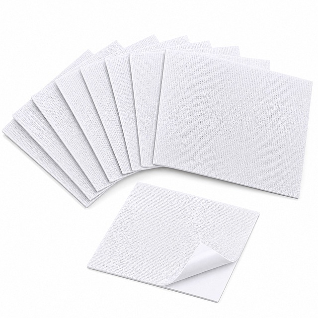 [主图-1] 商品名称：10 Pcs Rug Corner Grippers Anti-Slip Rug Pads Reusable Washable Rug Tape for Hardwood Floors and Tile Floors。本张为 Amazon 白底首图，画面不呈现任何文字。唯一任务：产品身份首图，一眼看清 10 件装白色方形角抓垫的数量、形状与正面质感。
[统一基调] 整套统一视觉：明亮清爽的家居功能型 listing 信息图；背景主色为纯白与浅灰（#F5F7FA）渐变，环境色为暖木色地板与奶油色地毯；标题字色深海军蓝 #1B2A41，辅助字色中灰 #5A6B7C，强调色清亮天蓝 #2D9CDB；全图只用一种无衬线几何粗体标题外观，副文案为同级细体；组件统一为白色圆角卡片、细浅灰描边、淡蓝圆形数字标、细线引线与圆形局部放大窗；光影为明亮自然柔光窗侧光与柔和接触阴影。
[画面] 纯白无缝背景，无任何道具、无地毯、无手部、无边框。画面主体为 10 件白色方形角抓垫，以扇形整齐叠展于画面中下部；其中一张单独正面平铺并微微倾斜，清晰显示表面细密白色纹理与薄片厚度；最前方一张的右下角离型纸轻微掀起，露出背面白色自粘胶层。产品完整不被切割，占画面 85% 以上，45° 俯视机位。严格保持输入图中产品的外观、形状、结构、材质、颜色与比例一致，可见件数准确为 10 件。
[光影质感] 明亮均匀的影棚柔光，产品下方只有干净柔和的接触阴影，无杂乱反光与硬边投影。
[配色] 纯白背景与白色产品，仅用白与极浅灰层次塑造体积感，不加彩色元素。
[文字版式] 本张为平台合规白底首图，画面不出现任何文字、图标、角标、边框或水印。
[输出要求] 1:1 正方形 2048x2048，产品清晰锐利、边缘干净、无灰底残留、无悬浮感；负向：变形、模糊、错字、杂乱、水印、平台 Logo、多余道具、手指、任何中文文字。