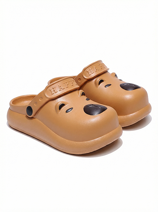 [Main Image 1] Product main image: bear caramel clog shoes, no holes. Product appearance must be 100% consistent with the original image, with a cute cartoon bear shape. Pure white background, product centered, occupies more than 85% of the frame. 45-degree placement of the left shoe. Shein fashion style, high definition product photography, soft studio light, clear detail presentation. No text, comply with cross-border e-commerce platform specification. Maintain the product is holeless.