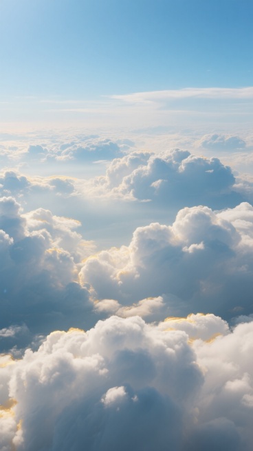 高空俯拍视角，湛蓝天空下无边无际的云海如蓬松棉花糖般层层叠叠，自然光透过云层间隙洒下形成光线通道与阴影变化，云朵边缘被阳光勾勒金边，清晰展现云层柔软纹理与色彩过渡，干净现实风格的云层背景素材，细节丰富具电影级视觉震撼。预览效果