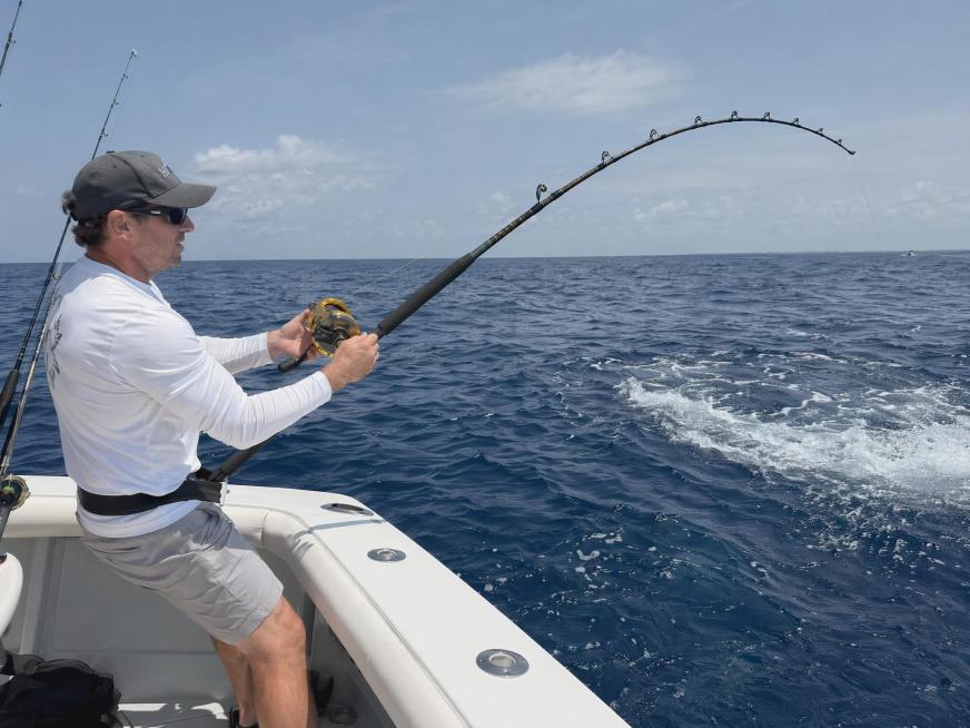 Screen 3: Real Offshore Boat Big Game Fishing Scene, A caucasian adult male angler on a sport fishin预览效果