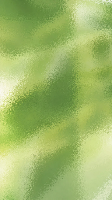去掉图片中的文字“GREENNESS”，参考原图的风格，重新生成渐变绿色的磨砂肌理纹理背景，保持原图的色调和质感预览效果
